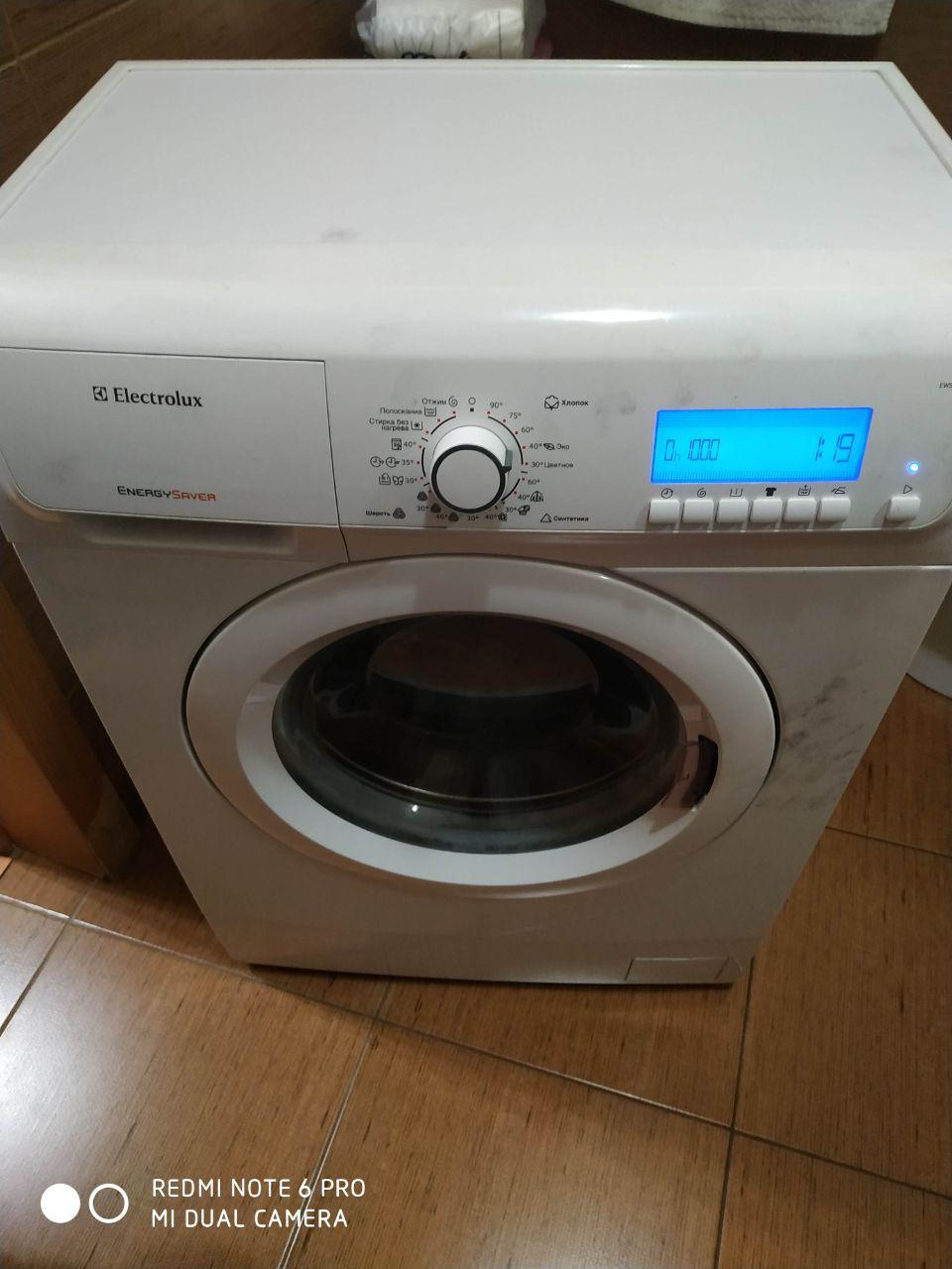 Фото белой стиральной машины Electrolux (Электролюкс)